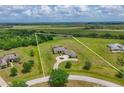 An aerial view of a house highlighting the property and its surrounding acreage at 6316 Foxbrook Trl, Parrish, FL 34219