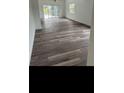 Spacious room featuring durable flooring, bright light and access to the outdoors at 4066 Amberjack Dr, Hernando Beach, FL 34607