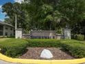 Community entrance sign amidst lush landscaping welcomes you to Shorewalk at 4315 45Th W Ave # 103, Bradenton, FL 34210