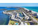 Wide aerial shot of the waterfront condo complex, showcasing its coastal location and serene harbor at 4380 Exeter Dr # 304, Longboat Key, FL 34228