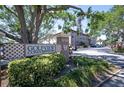 Inviting sign for Golfview Condominiums, set amid lush landscaping and mature trees at 6100 Gulfport S Blvd # 117, Gulfport, FL 33707