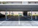 Designated covered parking area for residents, offering protection from the elements at 6100 Gulfport S Blvd # 117, Gulfport, FL 33707