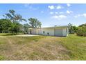 Exterior of the property showing a multi-car garage at 815 31St W Ave, Palmetto, FL 34221