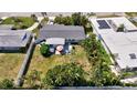 Aerial view of the property showcasing the home, yard, and surrounding neighborhood at 2307 Valencia Dr, Sarasota, FL 34239