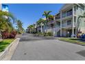 Community street view with colorful buildings and well-maintained landscaping at 3248 Mangrove Point Dr, Ruskin, FL 33570