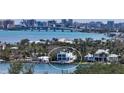 Waterfront property with unobstructed water views, private dock, and coastal elegance at 360 N Washington Dr, Sarasota, FL 34236
