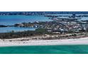 Aerial view of waterfront property with private beach access and a charming neighborhood at 360 N Washington Dr, Sarasota, FL 34236
