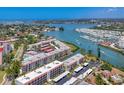 Aerial view of waterfront condos, boat docks, and scenic water views at 210 Santa Maria St # 244, Venice, FL 34285
