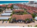 Desirable condo community with close proximity to the beach and covered parking at 6204 Midnight Pass Rd # 102, Sarasota, FL 34242