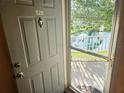 Inviting front entryway with views of the serene pond and fountain, offering a peaceful welcome at 850 S Tamiami Trl # 529, Sarasota, FL 34236