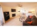 Inviting living room features a cozy fireplace and an open-concept layout at 850 S Tamiami Trl # 704, Sarasota, FL 34236