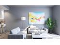 Cozy living room featuring modern decor, neutral tones, and an abstract painting on the wall at 2170 Robinhood St # A1-304, Sarasota, FL 34231