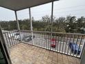 View from screened in patio overlooking the parking lot at 2700 Coconut Bay Ln # 432, Sarasota, FL 34237