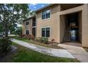 Two-story condo with well-kept lawn and flowerbeds adding curb appeal at 4061 Crockers Lake Blvd # 2618, Sarasota, FL 34238