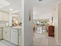 Bright and airy living space with tile floors and a seamless flow to other areas at 4355 Longmeadow # 23, Sarasota, FL 34235