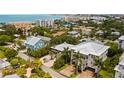 Beautiful aerial view of the house and neighborhood near the ocean and bay waters at 1021 Crescent St # 1, Sarasota, FL 34242