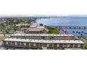 Exterior view highlighting condo building architecture and proximity to the waterfront at 150 Harborside Ave # 221, Punta Gorda, FL 33950