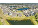 A community with many single Gathering homes around several ponds and green spaces in a well-planned neighborhood at 17555 Cantarina Cv, Bradenton, FL 34211