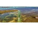 Scenic aerial view of ocean with boat channel and islands at 4821 Mount Vernon Dr # 4821, Bradenton, FL 34210