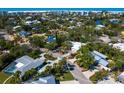 Beautiful home with lush landscaping and a circular driveway, near Siesta Key Beach at 5432 Cape Leyte Dr, Sarasota, FL 34242