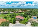 A Primary-planned community with single-Gathering homes surrounded by lush greenery, lakes, and greenbelts at 12838 Daisy Pl, Bradenton, FL 34212