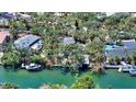 An aerial view of the home showing it sits on a canal at 5033 Oxford Dr, Sarasota, FL 34242