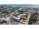 Stunning aerial view of a modern two-story home near the beach, showcasing its prime location and stylish design at 540 S Polk Dr, Sarasota, FL 34236
