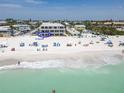 Aerial view of a lovely beachfront condo complex close to turquoise Gulf waters at 101 66Th St # 1, Holmes Beach, FL 34217