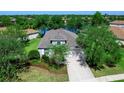 Charming single-Gathering home with a well-maintained lawn and mature trees in a quiet neighborhood at 14230 Cattle Egret Pl, Lakewood Ranch, FL 34202