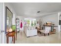 Inviting living room with a comfortable seating arrangement and plenty of natural light at 3036 Rose St, Sarasota, FL 34239