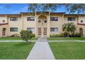 Charming exterior view of this two-story home with well-maintained lawn and inviting curb appeal at 5625 15Th Ave W, Bradenton, FL 34209