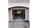 Attached garage with a light and window provides secure parking and storage for your vehicles and belongings at 5741 Soldier Cir # 202, Sarasota, FL 34233