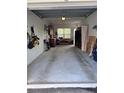 Attached garage with a light and window provides secure parking and storage for your vehicles and belongings at 5741 Soldier Cir # 202, Sarasota, FL 34233