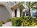 Inviting front entrance with stylish columns and well-maintained landscaping, creating curb appeal at 8045 Tybee Ct # 8045, University Park, FL 34201