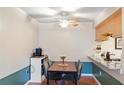 Bright dining area with stylish furniture adjacent to the kitchen, perfect for meals at 3269 Beneva Rd # 102, Sarasota, FL 34232