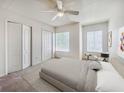 Bright bedroom features neutral tones, a comfortable bed, ample closet space, and a cozy ambiance at 238 Cape Harbour Loop # 104, Bradenton, FL 34212