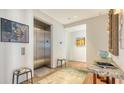 Elegant lobby with an elevator, decorative artwork, and stylish furnishings at 280 Golden Gate Pt # 600, Sarasota, FL 34236