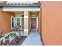 Welcoming front entrance featuring covered porch and dual doors at 288 Crew Ct, Sarasota, FL 34243