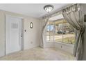 Bright entryway features a bay window with natural light, neutral walls, and a front door at 4420 101St W St, Bradenton, FL 34210