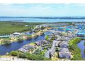 Scenic aerial view showcases community's waterfront location and neighborhood layout at 623 Estuary Dr, Bradenton, FL 34209