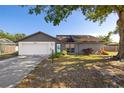 Charming single story home with well-maintained landscaping and a two-car garage at 6547 Samoa Dr, Sarasota, FL 34241
