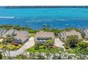 Beautiful waterfront homes with manicured lawns and serene water views at 78 Tidy Island Blvd, Bradenton, FL 34210