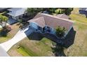 Overhead view of the property highlighting the home's landscaping, driveway, and layout at 807 Mohawk Rd, Venice, FL 34293