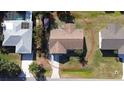 Aerial view of the home and adjacent properties, showcasing its location within the neighborhood at 807 Mohawk Rd, Venice, FL 34293