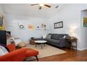 Spacious living room with vaulted ceilings, hardwood floors, and comfortable seating arrangement at 1052 32Nd St, Sarasota, FL 34234