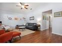 Bright living room featuring vaulted ceilings, hardwood floors, and stylish contemporary decor at 1052 32Nd St, Sarasota, FL 34234