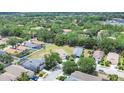 Residential area showcasing the homes, lawns, and mature trees in the neighborhood at 11236 Beebalm Cir, Lakewood Ranch, FL 34202