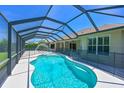 Inviting screened-in pool with fountain feature, surrounded by a large patio at 15518 29Th E St, Parrish, FL 34219