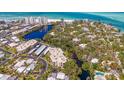 An aerial view of condos in a lush area at 225 Hourglass Way # 101, Sarasota, FL 34242