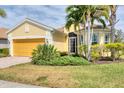 Charming single-Gathering home featuring a well-manicured lawn and a two-car garage at 19138 Kirella St, Venice, FL 34293